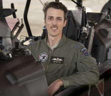 Squadron Anthony Leader Rose sitting inside the cockpit of a Texan aircraft